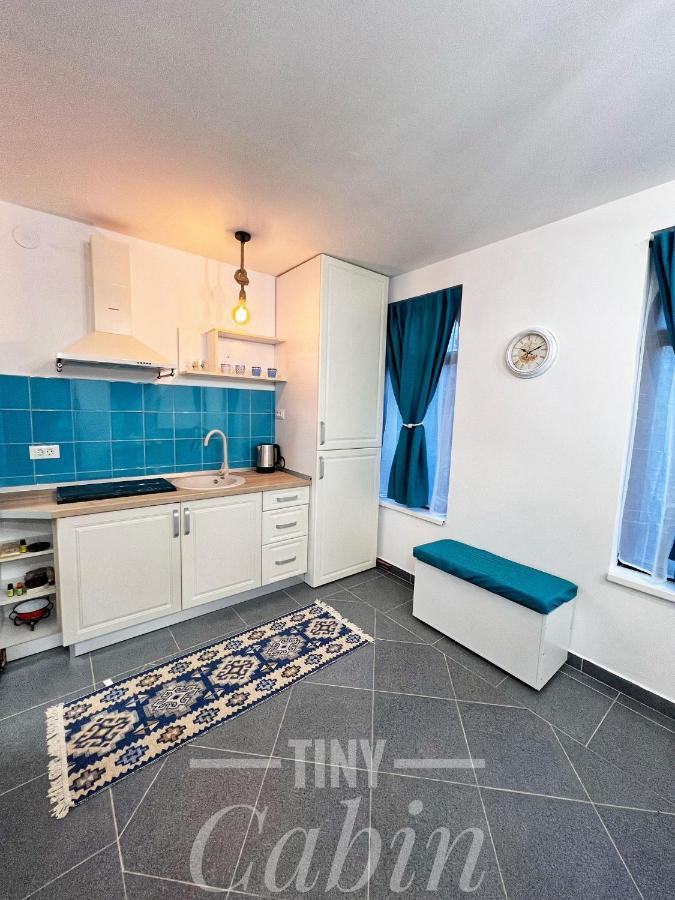 Tiny *